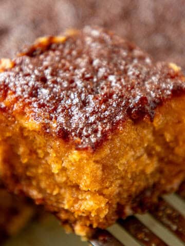 Malva pudding on cake lifter.