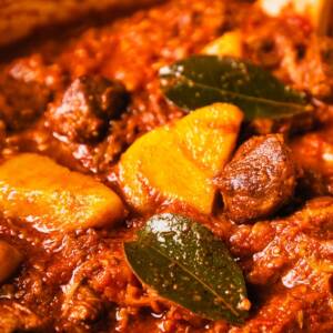 Traditional South African Tomato bredie in a casserole pan.