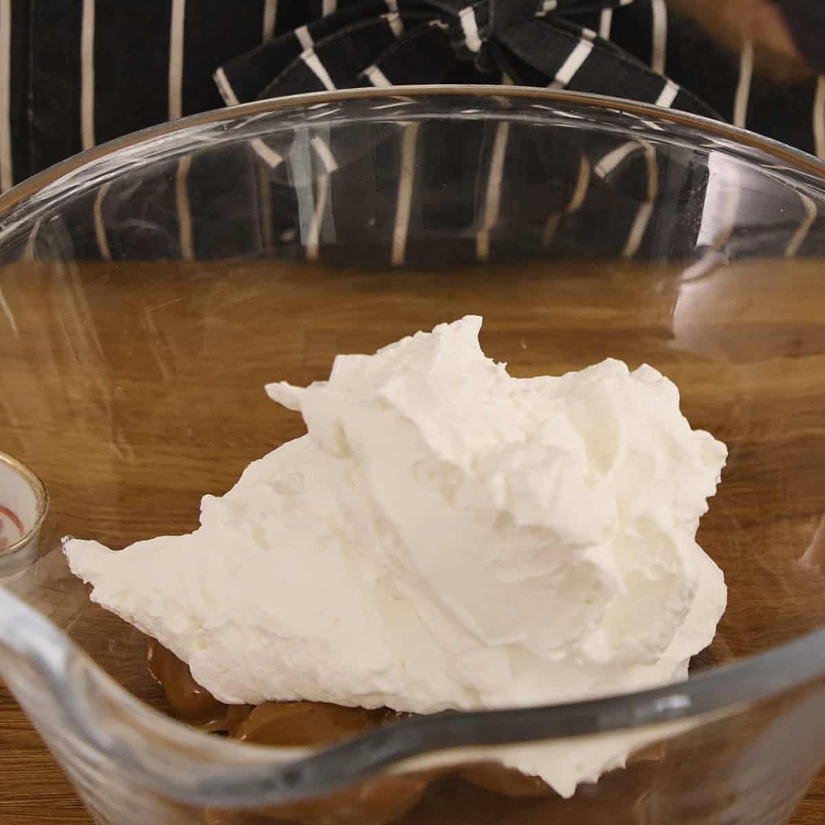 Whipped cream in a bowl.