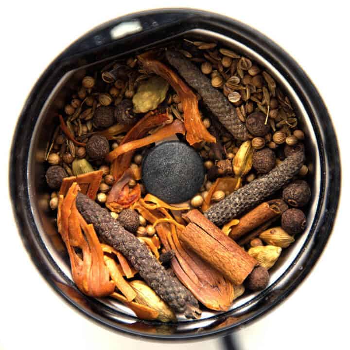 Whole spices in a blender.