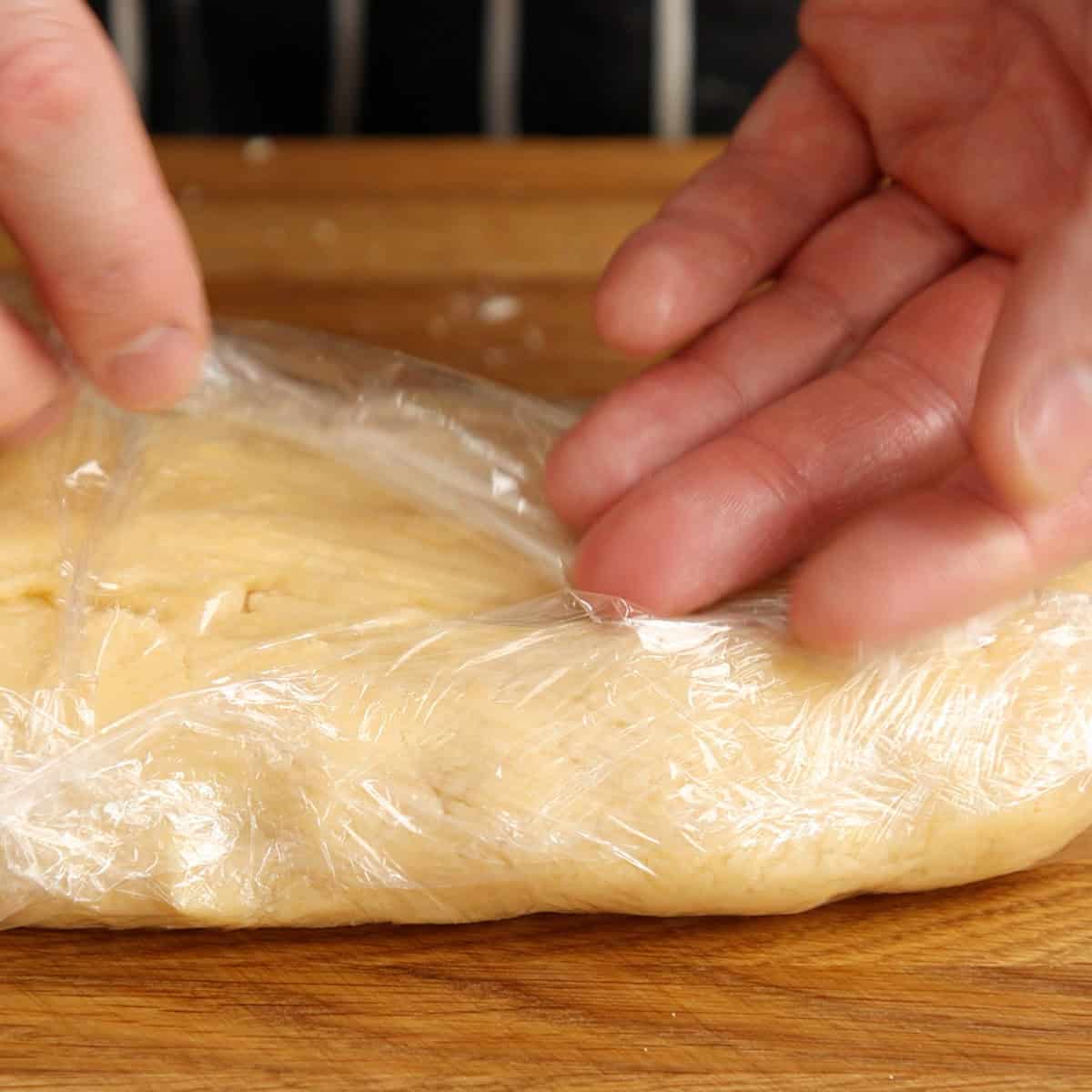 Wrapping pastry dough.